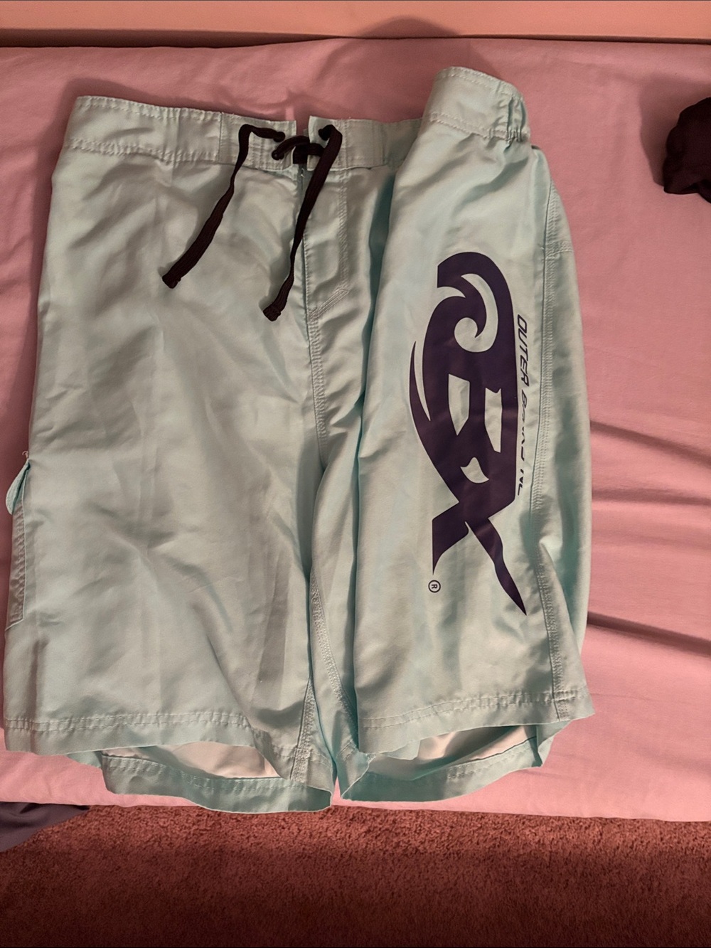Men's Light Aqua Board Shorts with Navy OBX (Outer Banks, NC) logo.